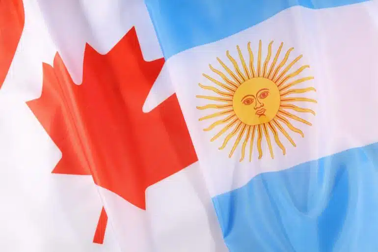 Flags of Canada and Argentina displayed side by side